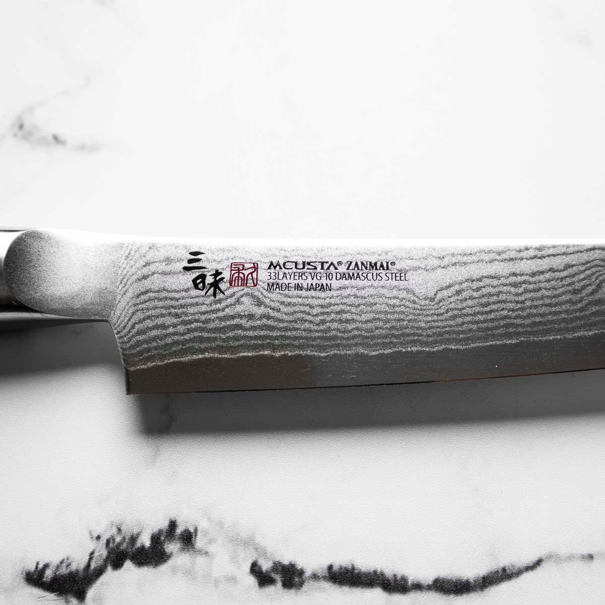 Mcusta Zanmai Corian Classic VG10 Damascus Petty 150mm