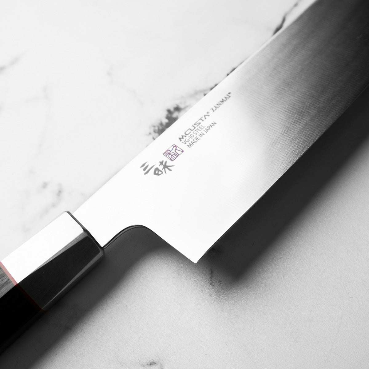 Mcusta Zanmai "Hybrid" VG10 Santoku 180mm