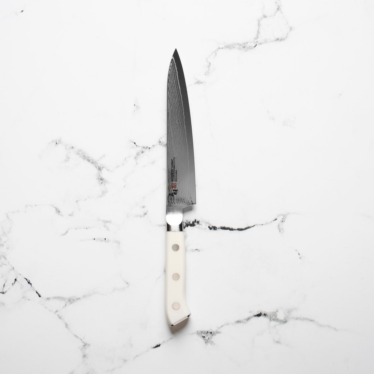 Mcusta Zanmai Corian Classic VG10 Damascus Petty 150mm