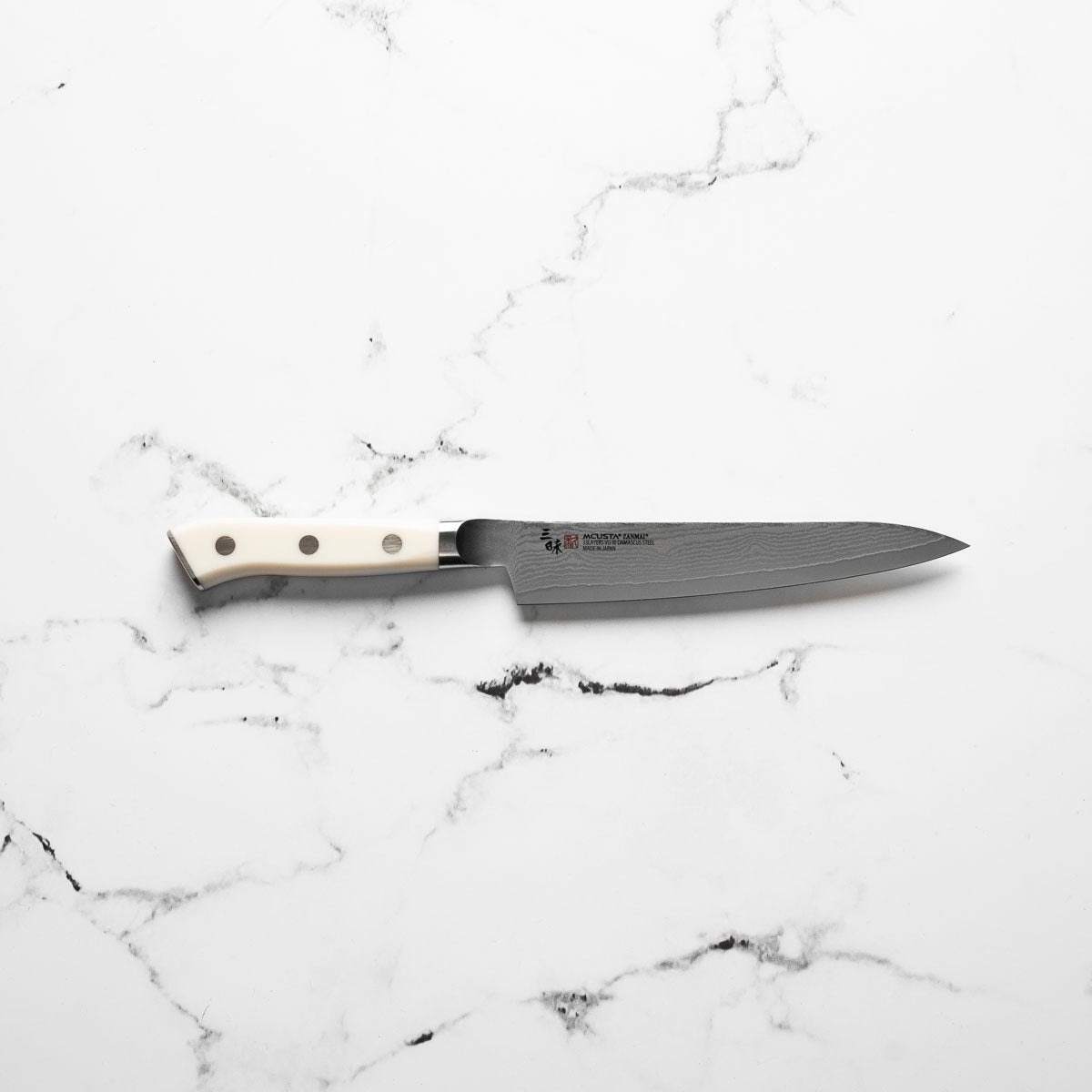 Mcusta Zanmai Corian Classic VG10 Damascus Petty 150mm